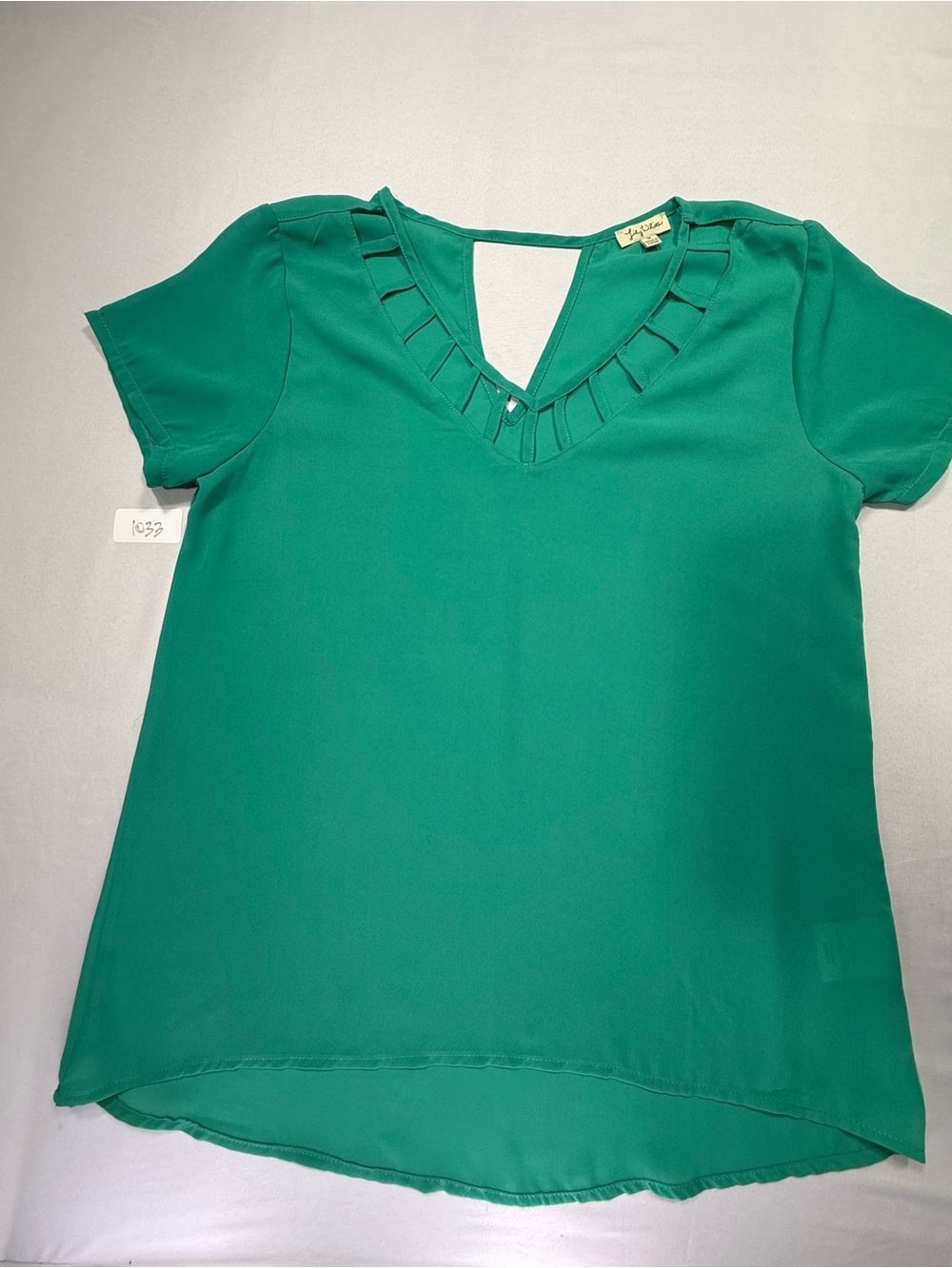 Lily White Emerald Green Short Sleeve V-Neck Blouse with Cutout Detail